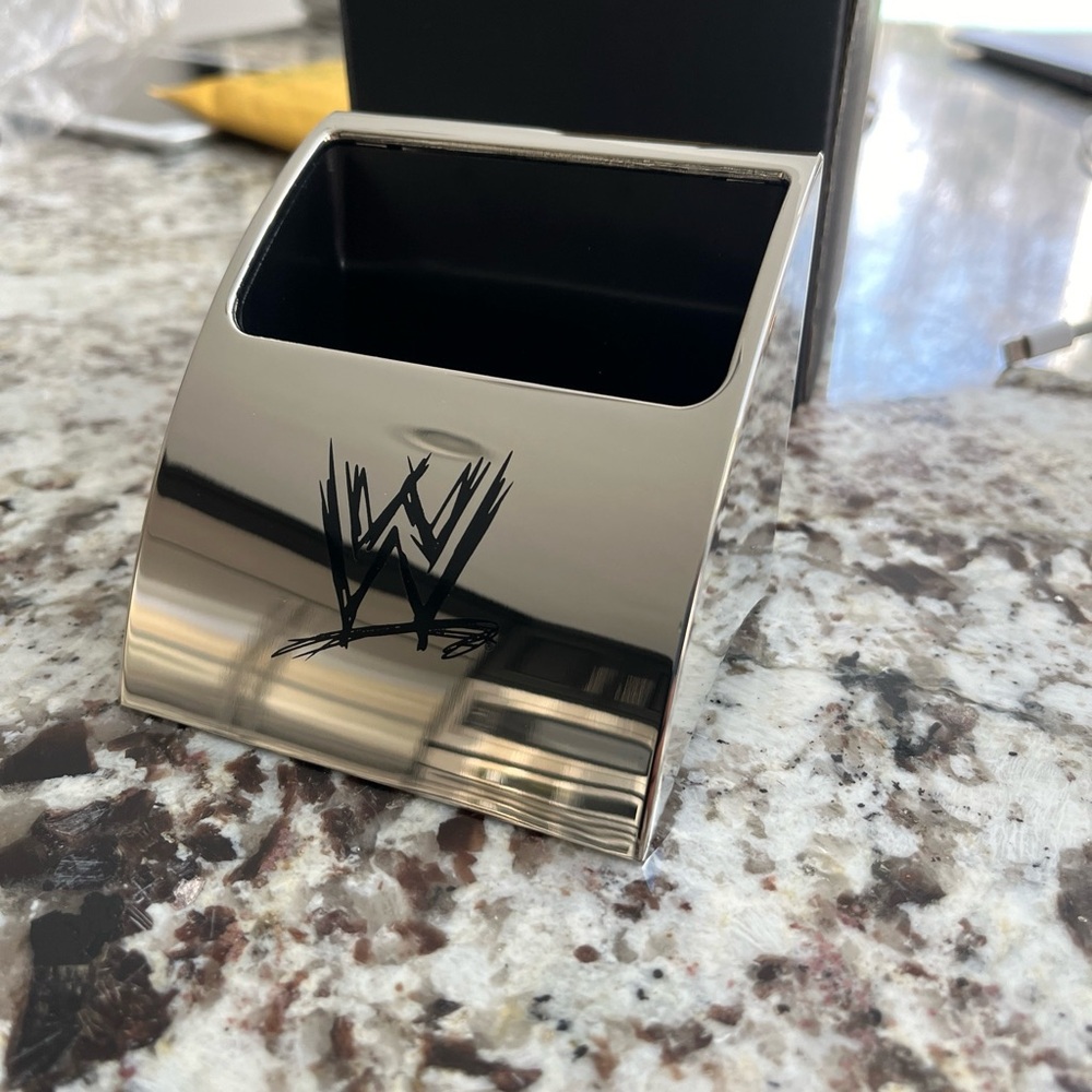 Brand new WWE world wrestling entertainment cel phone holder.